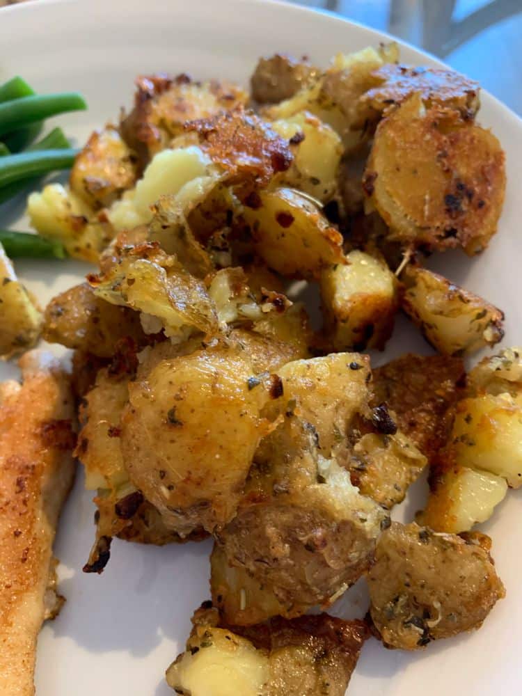 ROASTED GARLIC BUTTER PARMESAN POTATOES