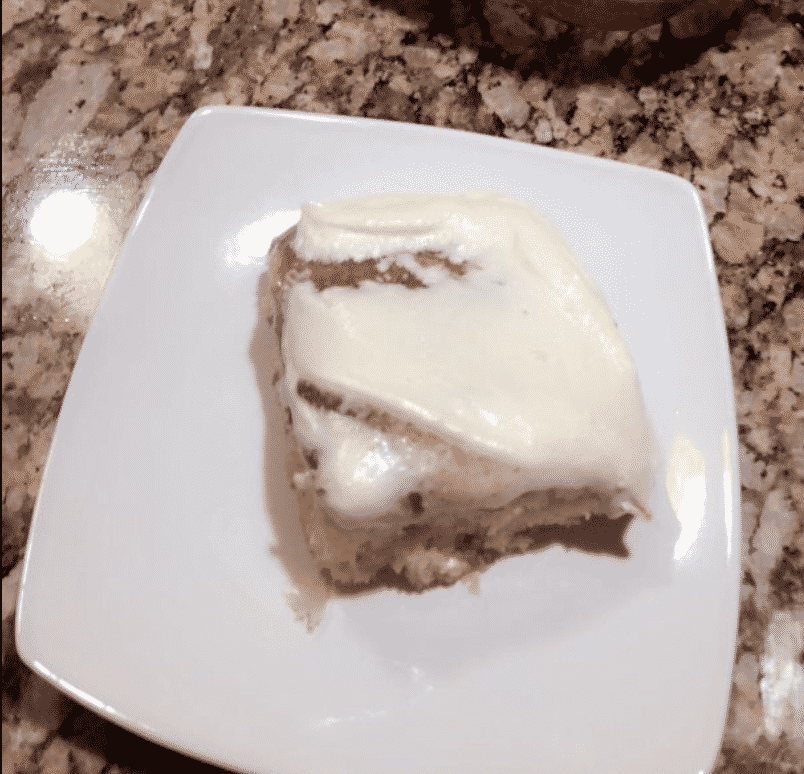 Sweet and moist Cinnamon Roll Cake with cream cheese frosting