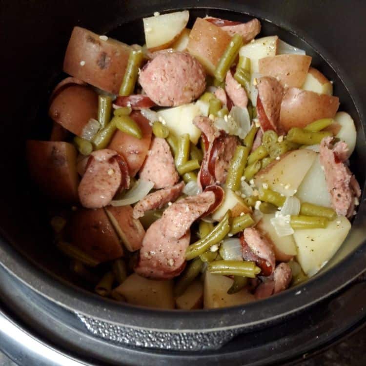 slow cooker cajun sausage, potatoes and green beans
