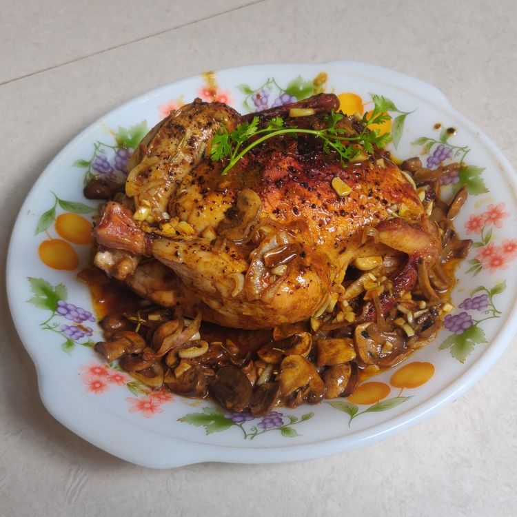 Easy Roast Chicken flavored with garlic, butter, and herbs