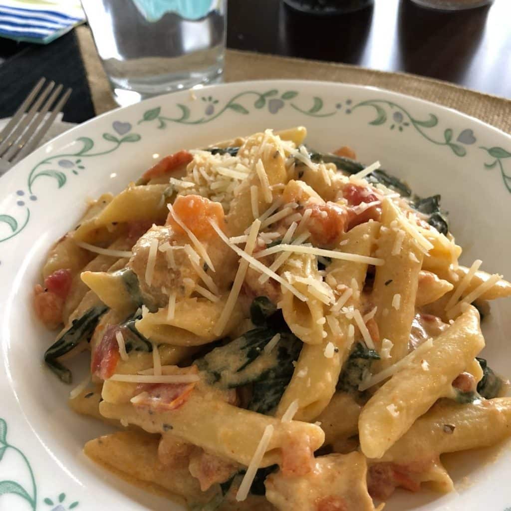 Chicken Bacon and Pasta with Spinach and Tomatoes in Garlic Cream Sauce