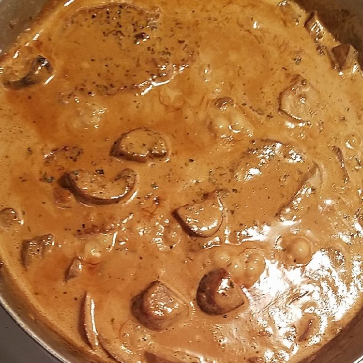 GARLIC PORK CHOPS IN CREAMY MUSHROOM SAUCE