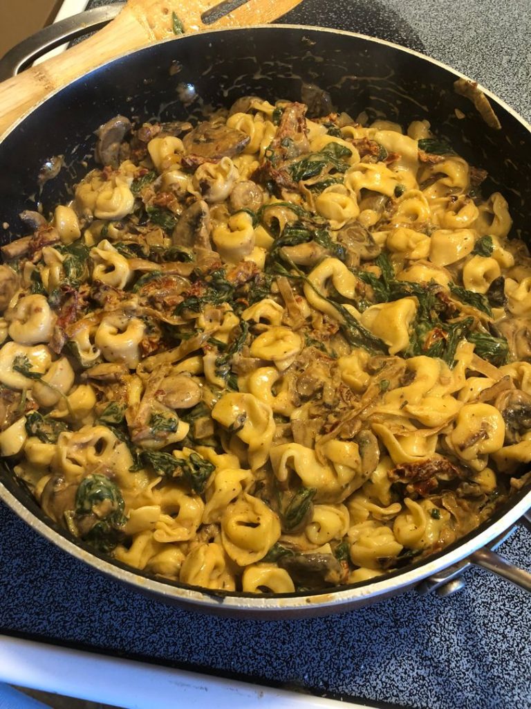 Creamy Spinach and Mushroom Tortellini with Caramelized Onions