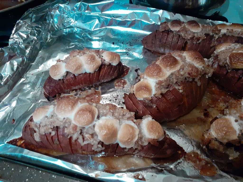 Hasselback Sweet Potatoes Stuffed with Marshmallows and MaplePecan Crumble